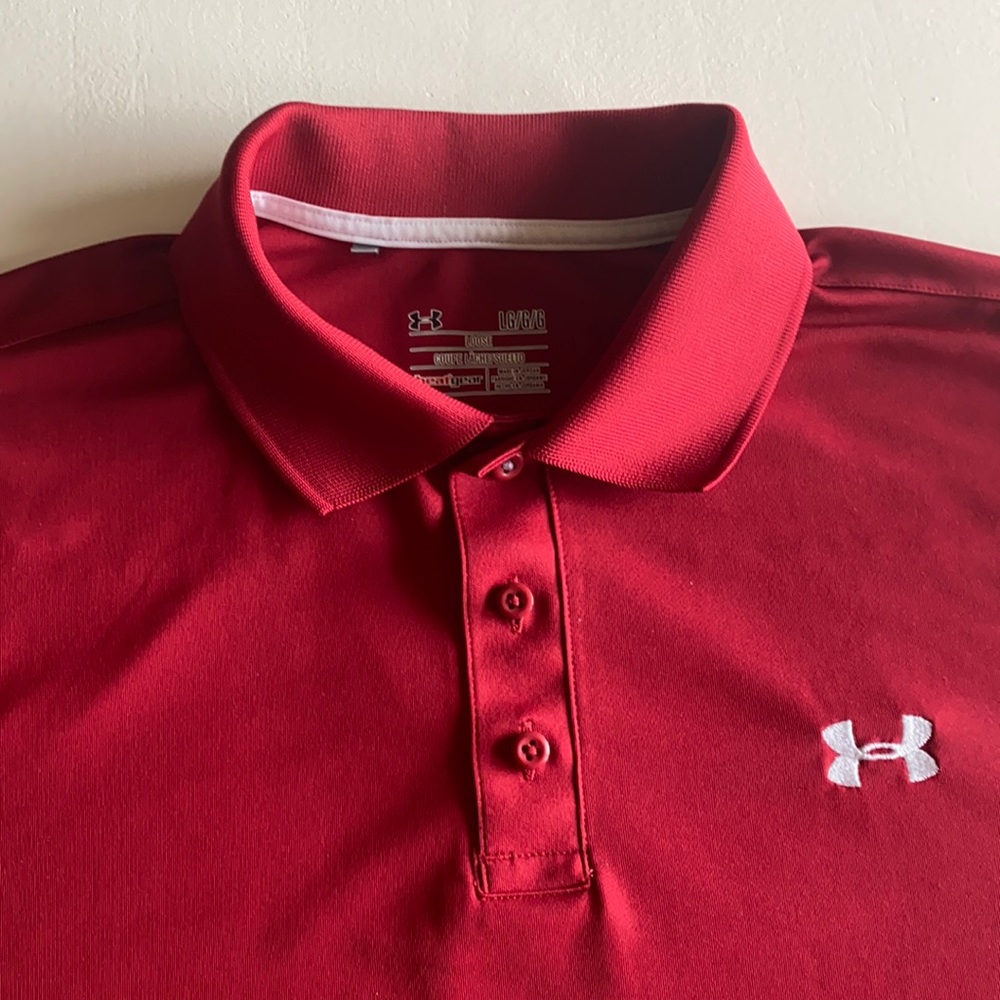 Large, loose fit, heat gear, under armor polo.